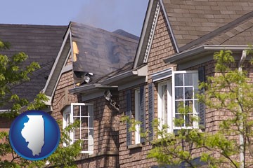 house fire damage with a smoldering roof - with Illinois icon