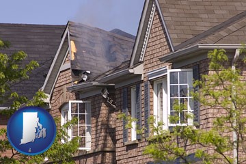 house fire damage with a smoldering roof - with Rhode Island icon