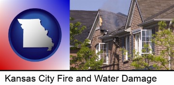 house fire damage with a smoldering roof in Kansas City, MO