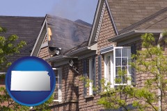 kansas map icon and house fire damage with a smoldering roof
