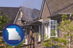 missouri map icon and house fire damage with a smoldering roof