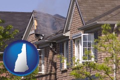 new-hampshire map icon and house fire damage with a smoldering roof