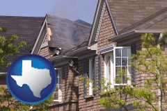 texas map icon and house fire damage with a smoldering roof